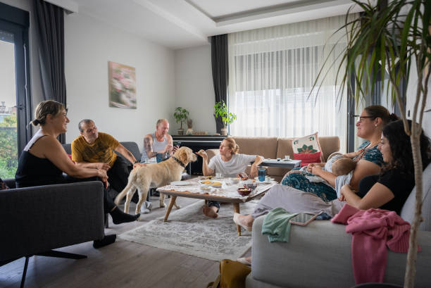 istock Home Party home gathering with middle age multiethnic friends 1500422783