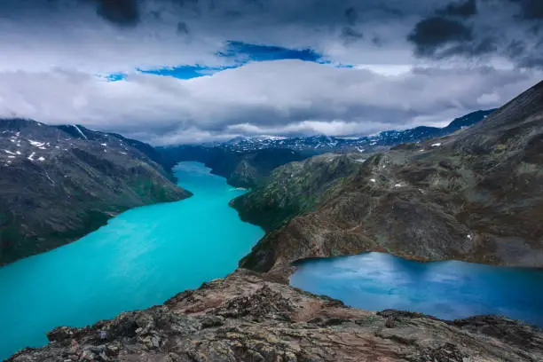 Amazing view of the Besseggen ridge, famous hiking spot in Jotunheimen National Park, admiring two glacial lakes with different colors