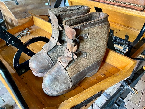 Close shot of old coachman shoes