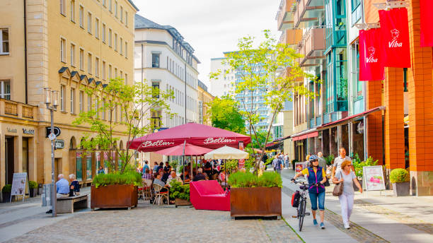 Chemnitz, Saxony, Germany, Outdoor street cafÃ© and restaurants with umbrellas stock photo