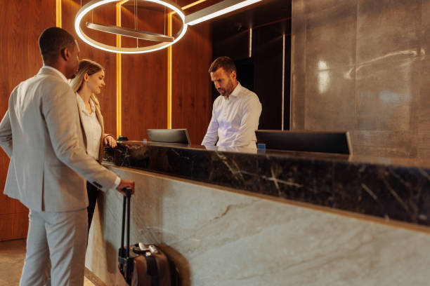 istock Diverse couple booking room in hotel 1500431301