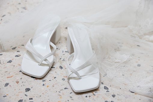 Ivory female wedding footwear isolated over white background