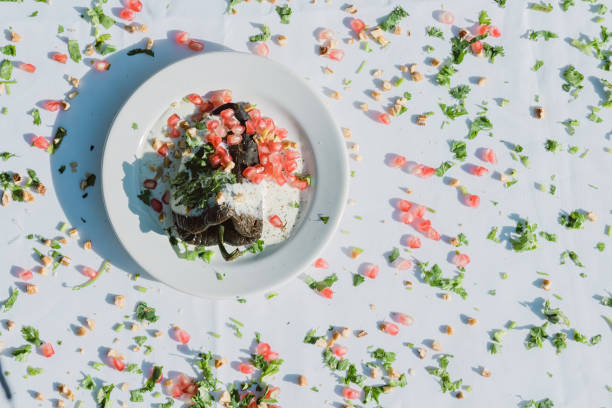 Chiles en Nogada: A traditional Mexican dish featuring stuffed peppers with walnut sauce and fruit garnish.