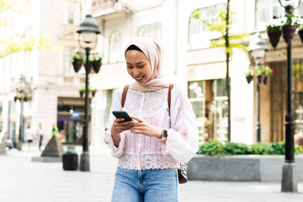 istock Shot of a young woman using her smartphone 1500442749