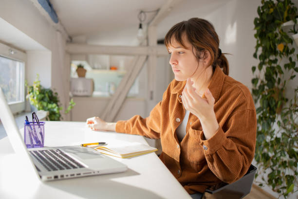 istock Young woman working from home 1500447356