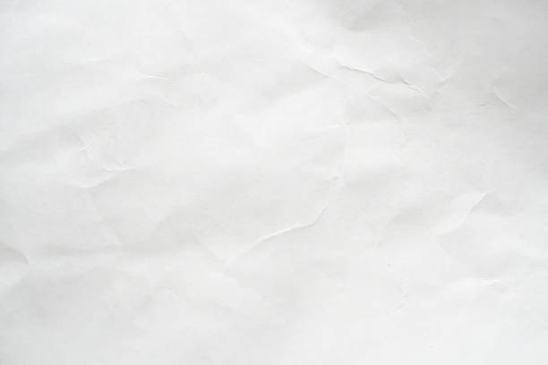 istock Abstract white crumpled and creased recycle paper texture background 1500447647