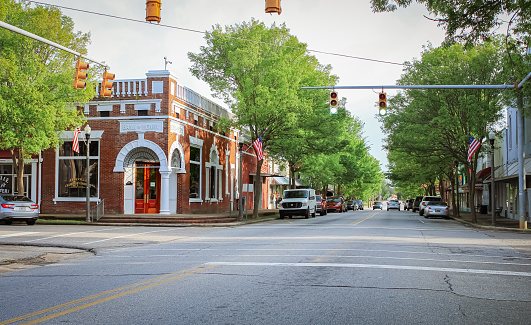 The townscape of Abbeville, Alabama in the evening with a historic bank building