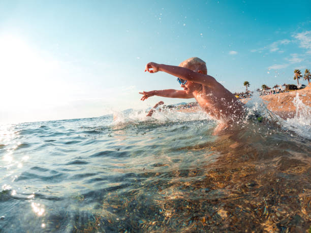 istock Happy Summer Days. Two Brothers Having Fun At The Beach 1500450007