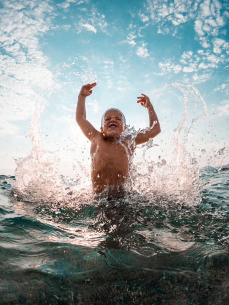 Happy Kid Enjoying A Careless Day At The Beach