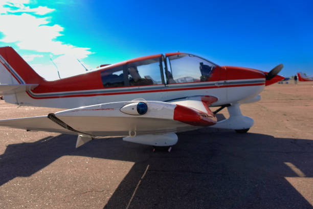 istock Side light lamp on the wing of an airplane close-up 1500457102