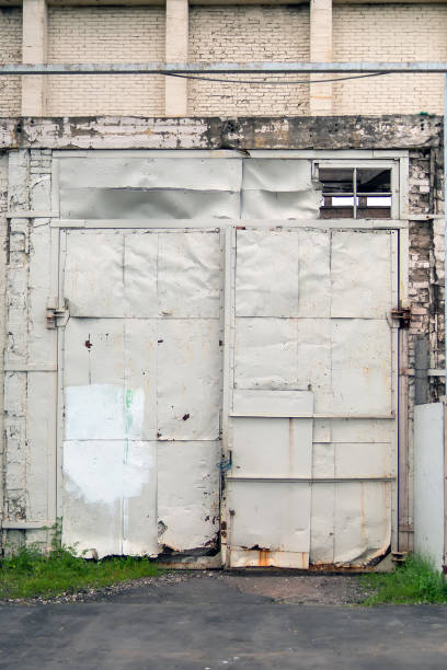 istock The gates made of iron sheets are painted with white paint 1500457237