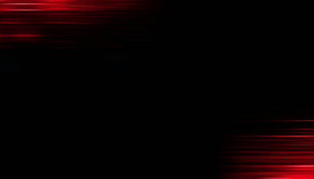 istock Abstract background blurred red colorful rays light on black with the gradient texture lines effect motion design pattern graphic. 1500460892