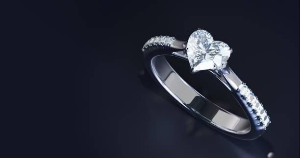 istock 3d render platinum diamond ring design on black background. The concept of a studio in a jewelry store. 1500461641