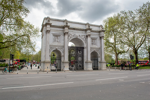London, UK - May, 9, 2023 : The Marble Arch monument in London, UK. The Marble Arch is a 19th-century white marble-faced triumphal arch in London.
