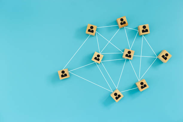 istock Human wooden connection communication network blue background. teamwork link management corporate. 1500464345