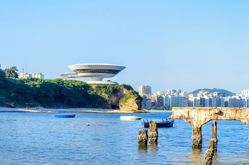 The Museum of Contemporary Art of Niterói (MAC) was designed by Oscar Niemeyer, a very important Brazilian architect. In 2020, the Museum of Contemporary Art was elected, by the Project Management Institute (PMI), as one of the 10 most influential works of architecture in the last 50 years.