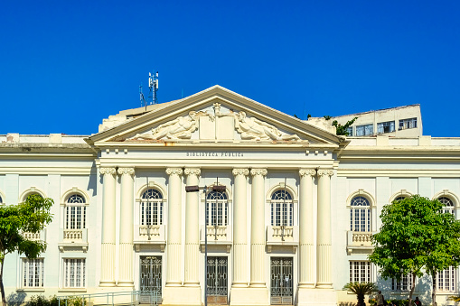 Rio de Janeiro, Brazil - June 8, 2023: Public Library facade. Low-angle of the facade of a white city building. The structure showcases unique architectural features.