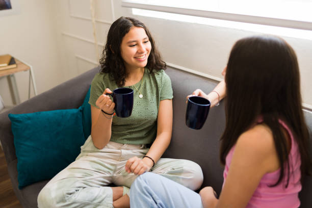 istock Happy teenagers hanging out drinking tea 1500468989