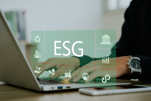 istock Businessmen use a computer to analyze ESG, surrounded by ESG icons close to the computer screen in business investment strategy concept. 1500479115