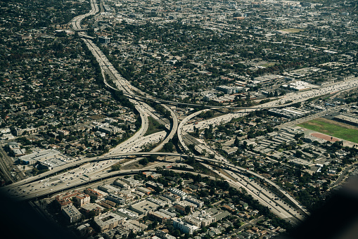 Aerial view of highway interchange with downtown city Los Angeles, USA. High quality photo