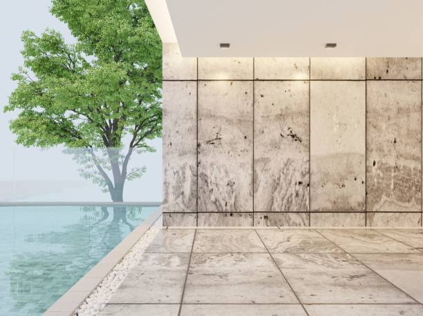 istock The balcony below the building It is simple, modern, with polished cement tile floors and polished cement walls. Adjacent to the swimming pool overlooking the big trees.3d rendering 1500481282