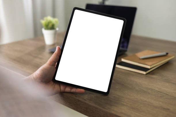 istock man hand holding digital tablet touch white screen device isolated screen ONLINE ADVERTISING communication empty space frame mockup, internet touchpad touchscreen information ipad 1500481961