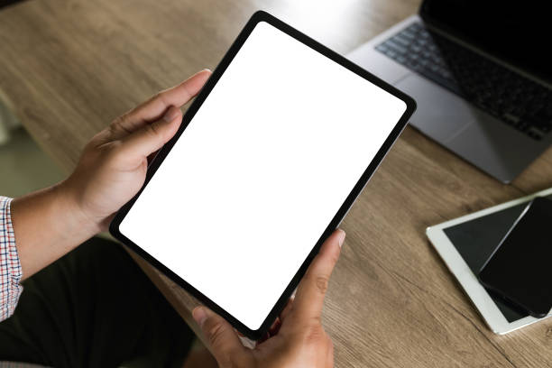 istock man hand holding digital tablet touch white screen device isolated screen ONLINE ADVERTISING communication empty space frame mockup, internet touchpad touchscreen information ipad 1500481967