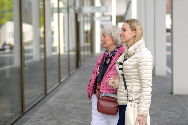 istock Mother and daughter shopping in a mall 1500482368