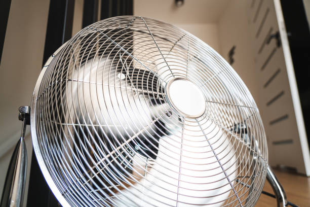 istock Floor fan. Summer heat. 1500487828