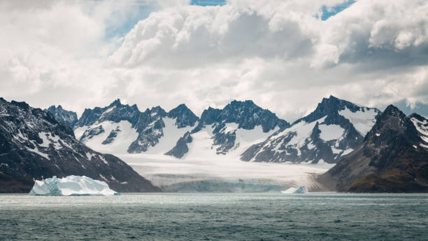 istock Antarctic Peninsula Coastal Glacier, Iceberg and Mountain Range Panorama 1500489284