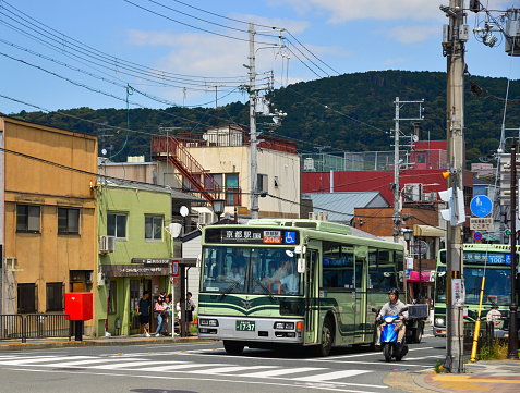 Kyoto, Japan - Jun 24, 2019. A local bus running on street in Kyoto, Japan. The Kyoto City Buses are major mean of public transport in Kyoto.