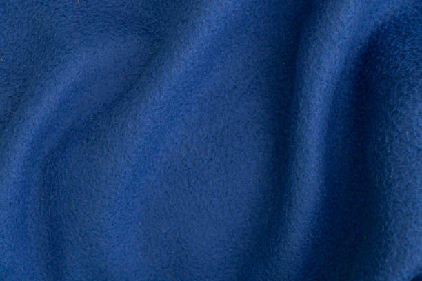 istock plain dark blue fabric made of artificial materials as a wallpaper close-up 1500490467