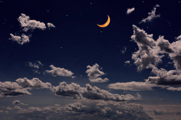 istock Strawberry crescent moon rising over the cloudscape 1500491244