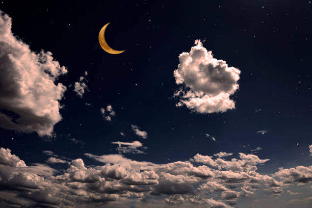 istock Strawberry crescent moon rising over the cloudscape 1500491252