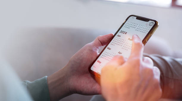 istock Concept for financial planning and reminder for 2024. man using smartphone working with calendar 2024, business planning marketing and investment 1500491872