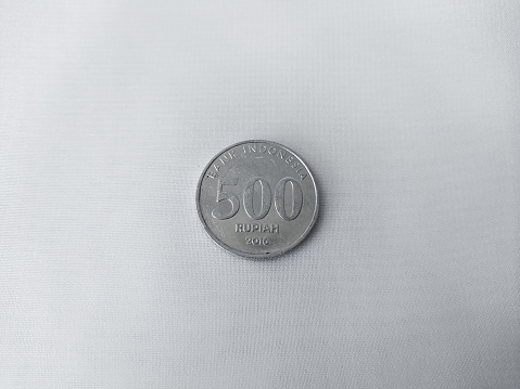 Pictures of one thousand and five hundred Indonesian rupiah coins