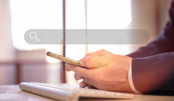 istock search engine SEO concept, businessman using keyboard and smartphone searching information surfing on the internet, online data search. optimize your website to rank in search engines or SEO. 1500494002