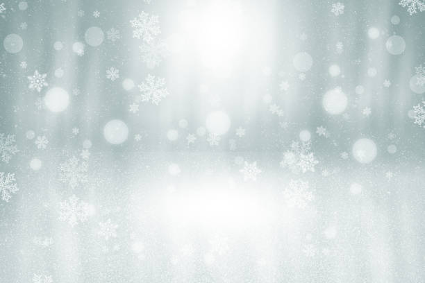 istock Blue gray abstract background. white light and snowflakes Christmas blurred beautiful shiny lights use wallpaper backdrop and your product. 1500494090