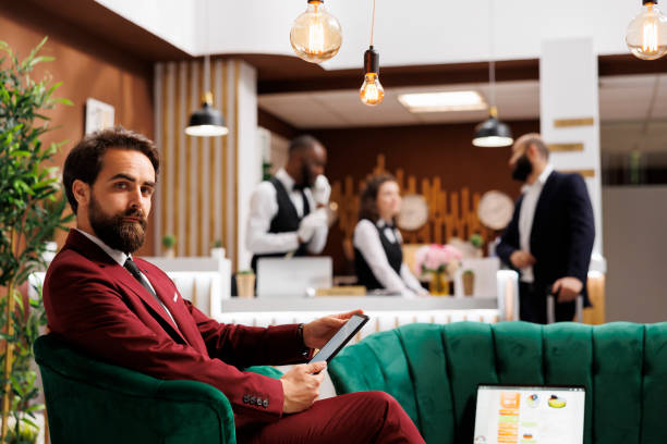 istock Entrepreneur in suit at hotel 1500494938