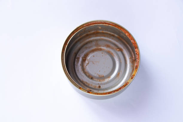 istock dirty tin can after eaten sprats on a white background 1500496619