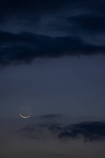 istock eclipse of the moon with clouds 1500499158