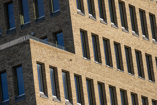 Gothenburg, Sweden - March 05 2023: Terrace of a brick high rise office building.