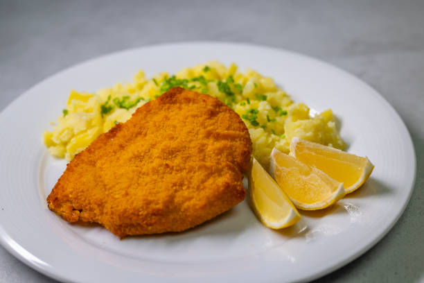 istock Chicken cutlet with couscous and lemon 1500503569
