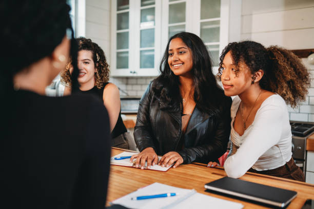 istock Friends are studying together at home 1500511023