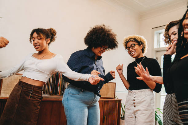 istock Friends are dancing together at home 1500511077