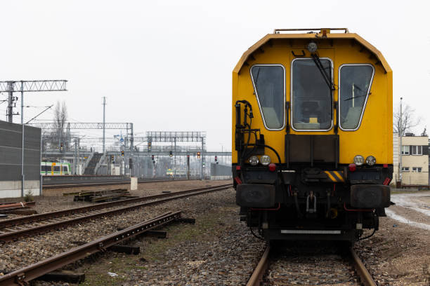 istock A yellow technical train for grinding rails standing on a railway siding. 1500512972