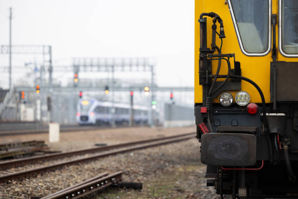 istock A yellow technical train for grinding rails standing on a railway siding. 1500512997