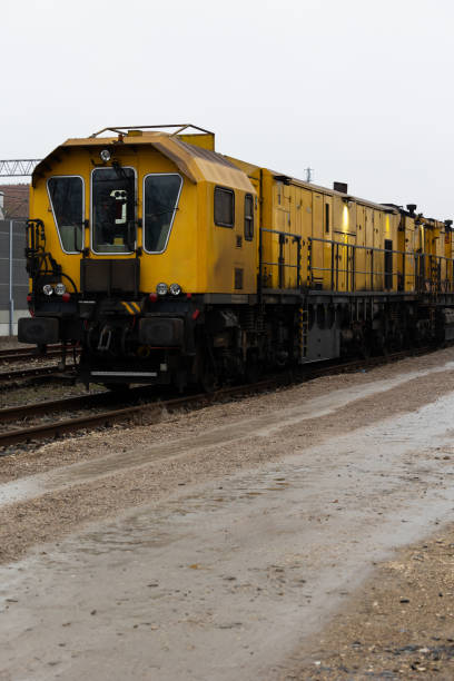 istock A yellow technical train for grinding rails standing on a railway siding. 1500513032