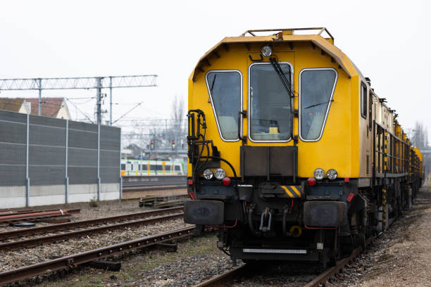 istock A yellow technical train for grinding rails standing on a railway siding. 1500513058