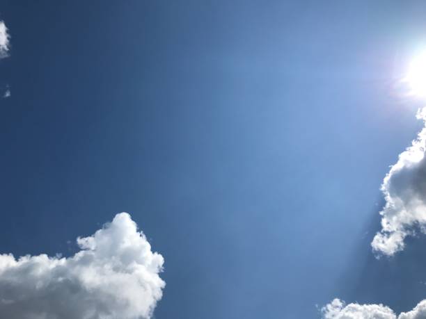 istock beautiful sky background with clouds in blue sky. Sunlight and Clouds 1500513137